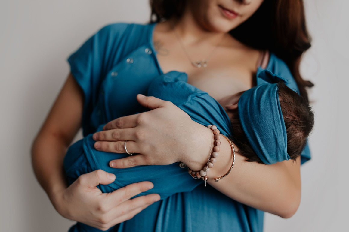 How Do the Fold-Down Front Panels of the Three Little Tots Delivery and Nursing Gown Aid in Nursing and Skin-to-Skin Bonding?