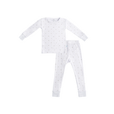 White pajama set with small patterns on a white background
