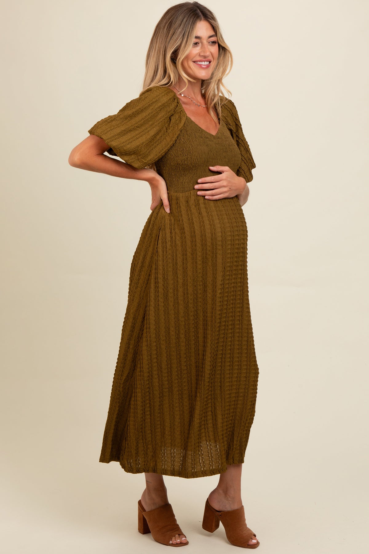 Three Little Tots Olive Smocked V-Neck Short Puff Sleeve Textured Maternity Midi Dress, alternate angle