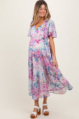 Woman wearing a floral dress on a white background
