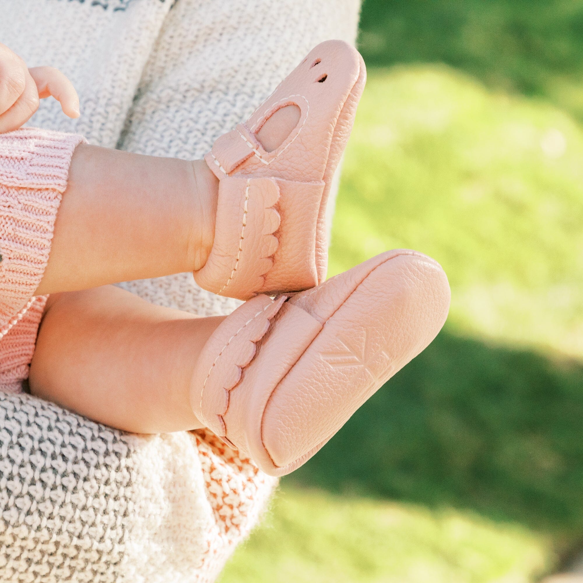 Three Little Tots Newborn Blush Mary Jane Baby Shoe, shown in everyday use