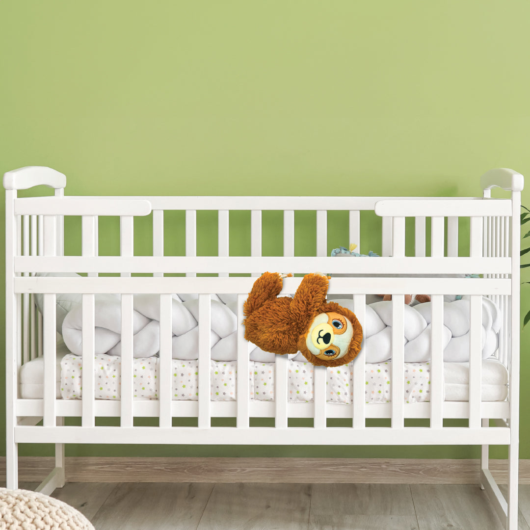 Three Little Tots Shusher Sloth 6-Pack Shushie Pacifiers Soothing Bundle with Cuddly Cry Detection, attached to a car seat or