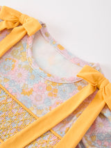Three Little Tots Yellow Bow Smocked Floral Baby Bubble, alternate angle