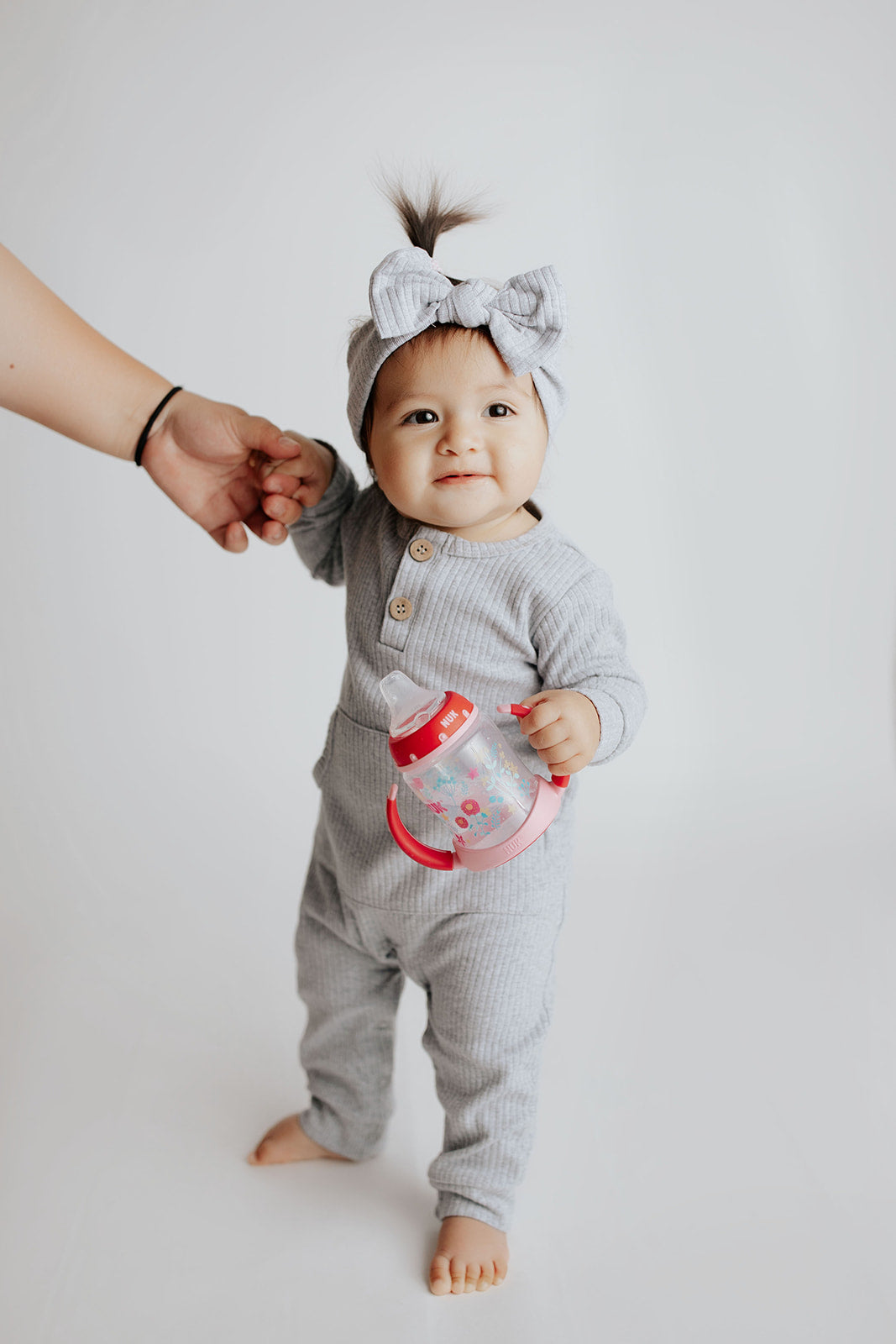 Stylish and functional, our ribbed organic cotton long-sleeve onesie features leg snaps and buttons for easy changes.Stylish and functional, our ribbed organic cotton long-sleeve onesie features leg snaps and buttons for easy changes.
