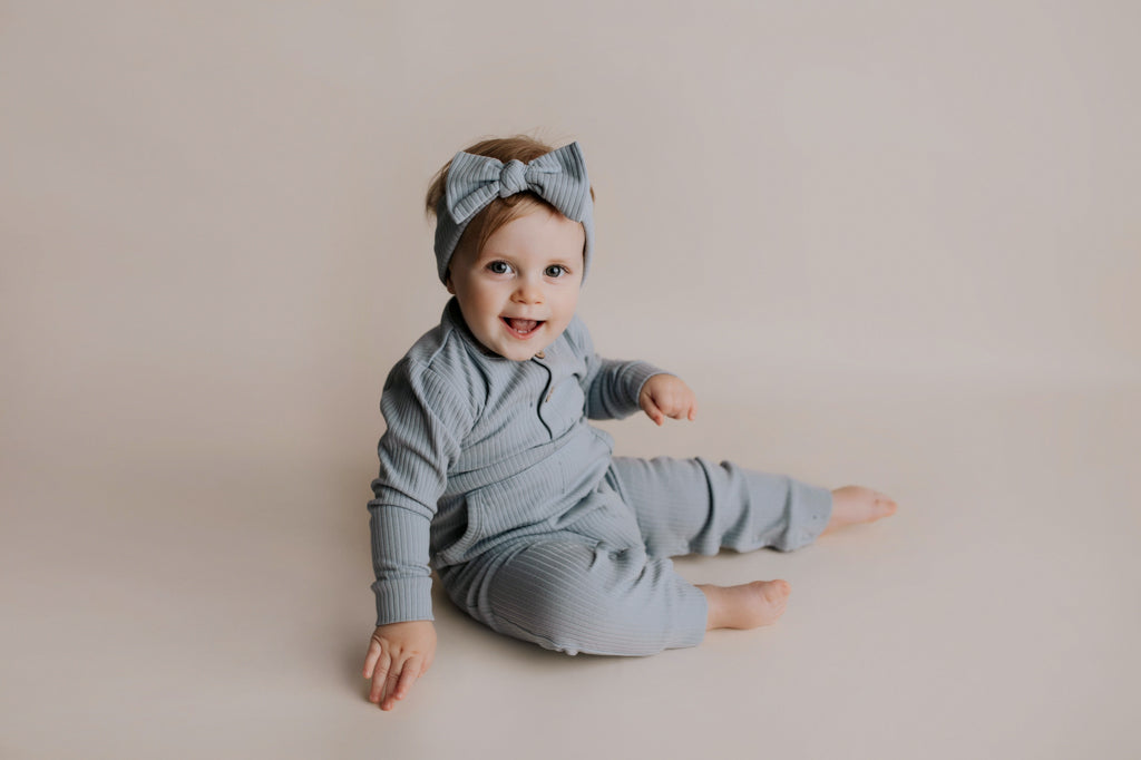Experience ultimate comfort with our soft ribbed cotton onesie, perfect for both lounging and adventures.