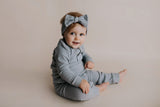 Experience ultimate comfort with our soft ribbed cotton onesie, perfect for both lounging and adventures.