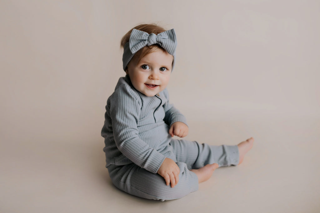 Experience ultimate comfort with our soft ribbed cotton onesie, perfect for both lounging and adventures.