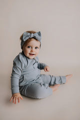 Experience ultimate comfort with our soft ribbed cotton onesie, perfect for both lounging and adventures.