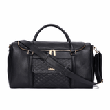 Three Little Tots Weekender Travel Bag Ebony Black, attached to a car seat or stroller