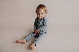Experience ultimate comfort with our soft ribbed cotton onesie, perfect for both lounging and adventures.