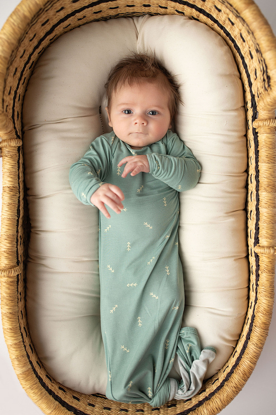 Three Little Tots Arrow Newborn Knotted Baby Gown. Ultra Soft baby gown.  Newborn Baby in a Snuggle Me Organics in a Plum and Sparrow Moses Basket