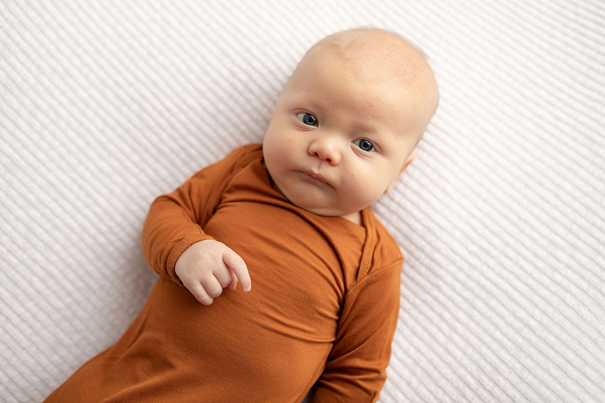 Three Little Tots Knotted baby gown saddle longhorn orange. The top knotted baby gown. Ultra soft bamboo like knotted baby gown