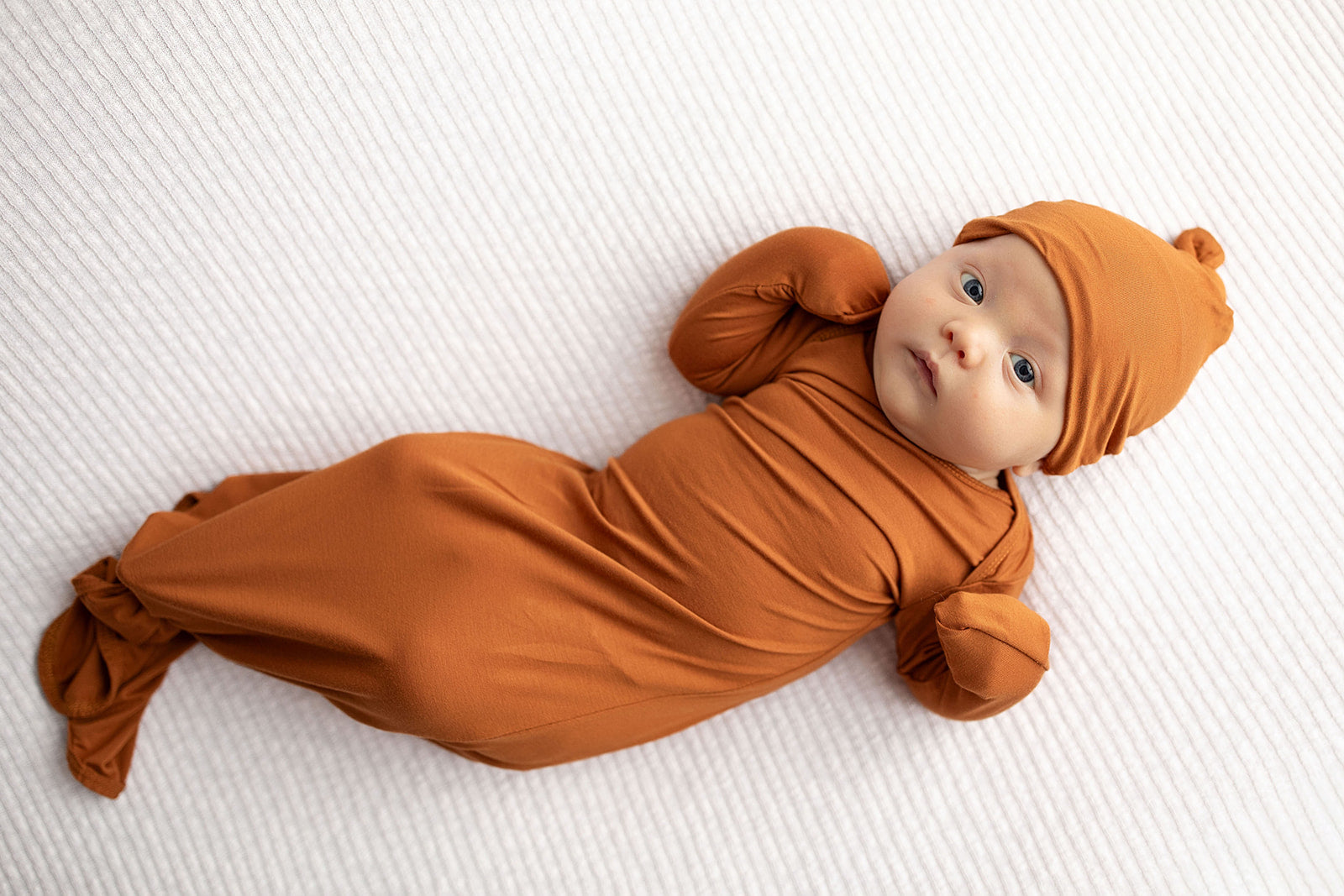 Three Little Tots Knotted baby gown saddle longhorn orange. The top knotted baby gown. Ultra soft bamboo like knotted baby gown