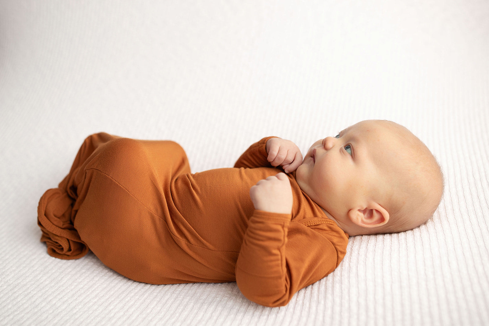Three Little Tots Knotted baby gown saddle longhorn orange. The top knotted baby gown. Ultra soft bamboo like knotted baby gown