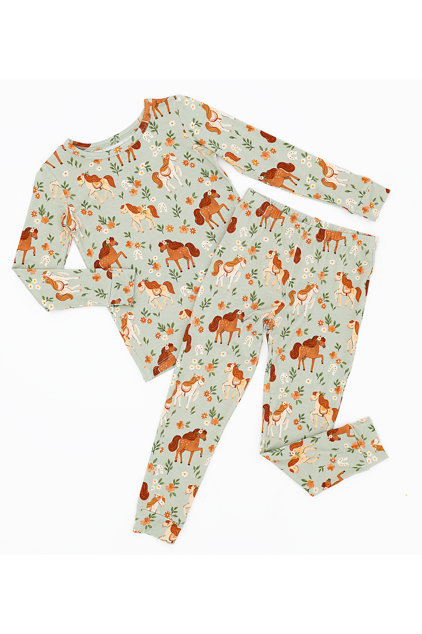 Children's pajama set with horse pattern on a white background