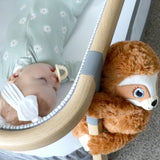 Three Little Tots Shusher Sloth Plush Sound Machine, attached to a car seat or stroller
