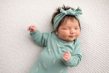 Three Little Tots Arrow Newborn Knotted Baby Gown with bow. Newborn baby photoshoot with lots of hair