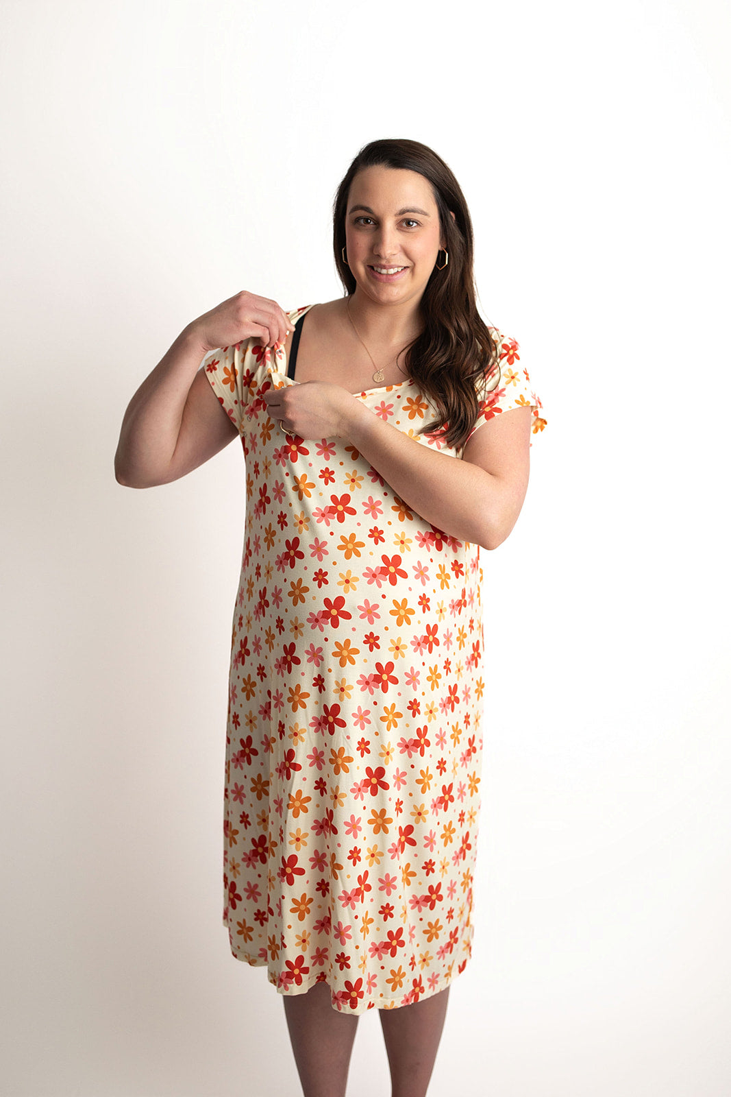 Three Little Tots Groovy Floral Hospital Labor and Delivery Gown. Hospital gown that features snaps down the shoulders. These snaps allow for easy access to pull up and down IVs and easy access for instant skin on skin and breastfeeding.