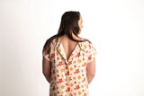 Three Little Tots Groovy Floral Hospital Labor and Delivery Gown.  Snaps down the back of the hospital gown allow for easy access for monitors while keeping you covered.