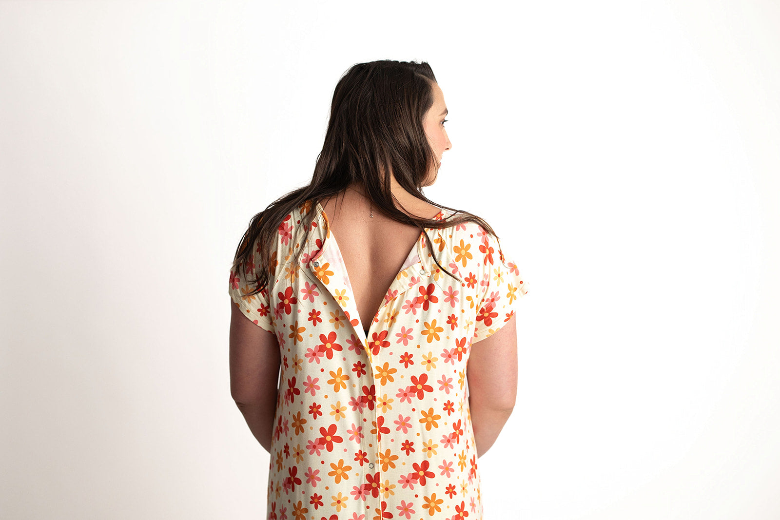 Three Little Tots Groovy Floral Hospital Labor and Delivery Gown.  Snaps down the back of the hospital gown allow for easy access for monitors while keeping you covered.