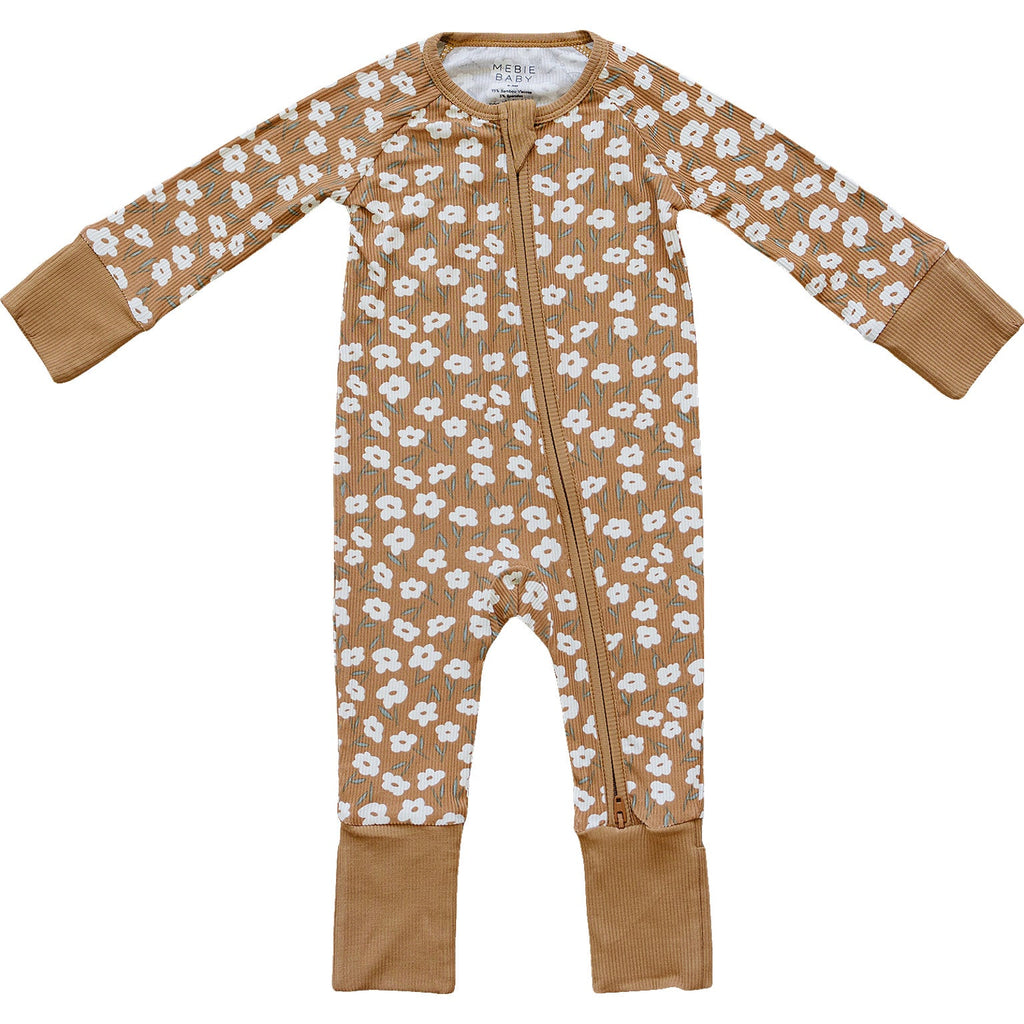 Baby onesie with floral pattern on a white background