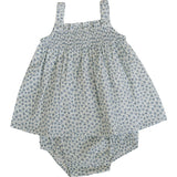Floral-patterned baby romper on a white background