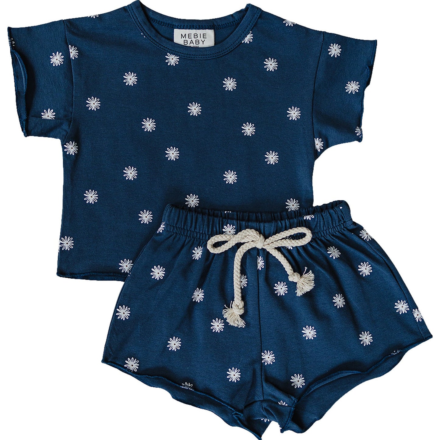 Children's navy blue outfit with white floral patterns on a white background