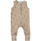 Beige baby romper with printed designs on a white background