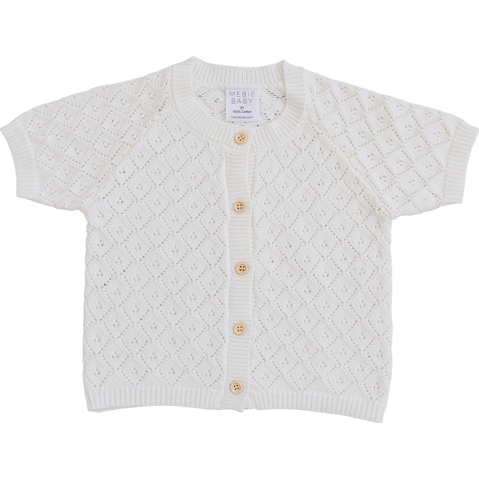 White baby cardigan with button details on a white background