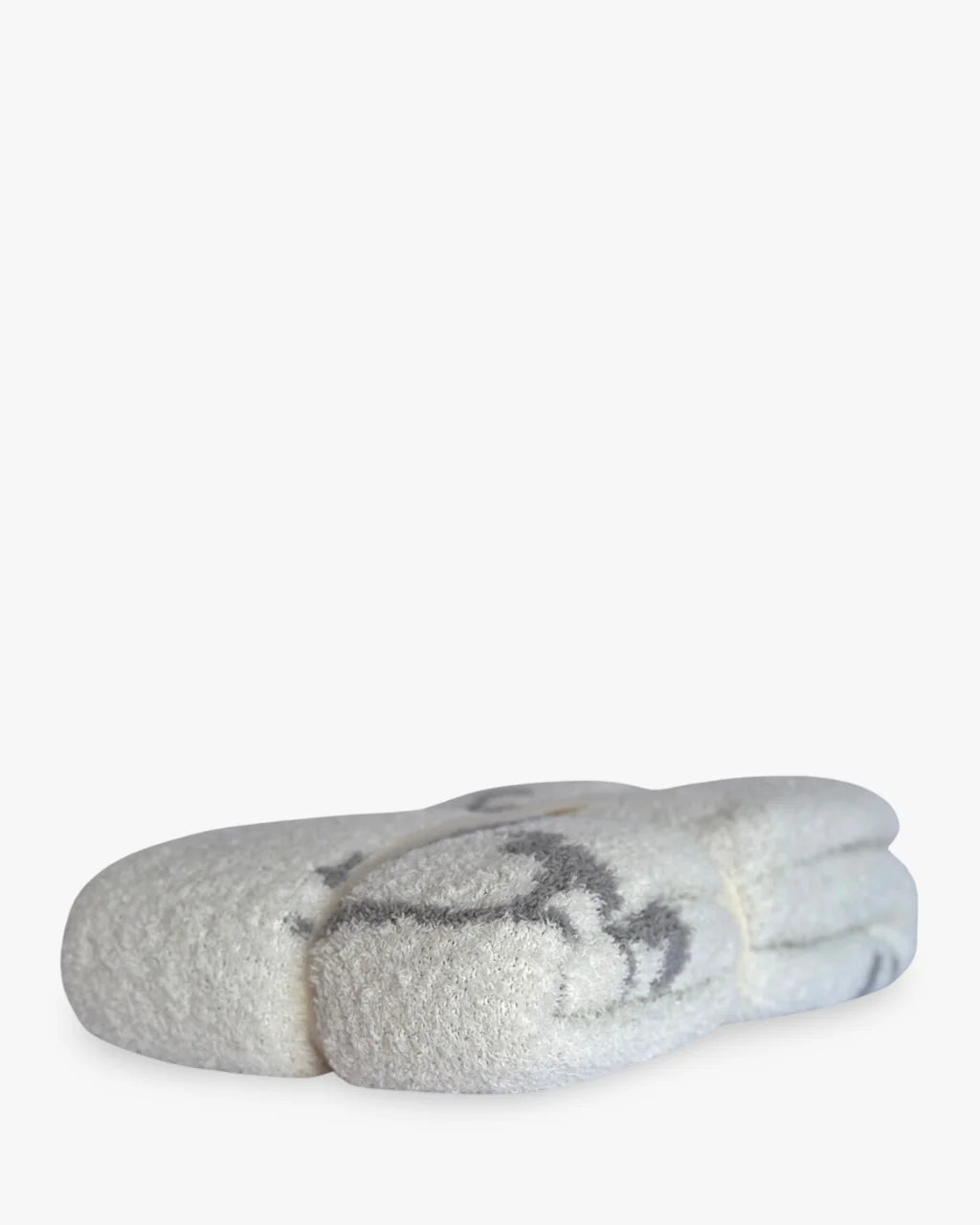 Pair of gray socks with a pattern on a white background