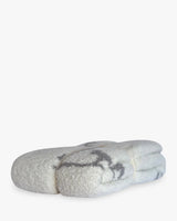 Pair of gray socks with a pattern on a white background