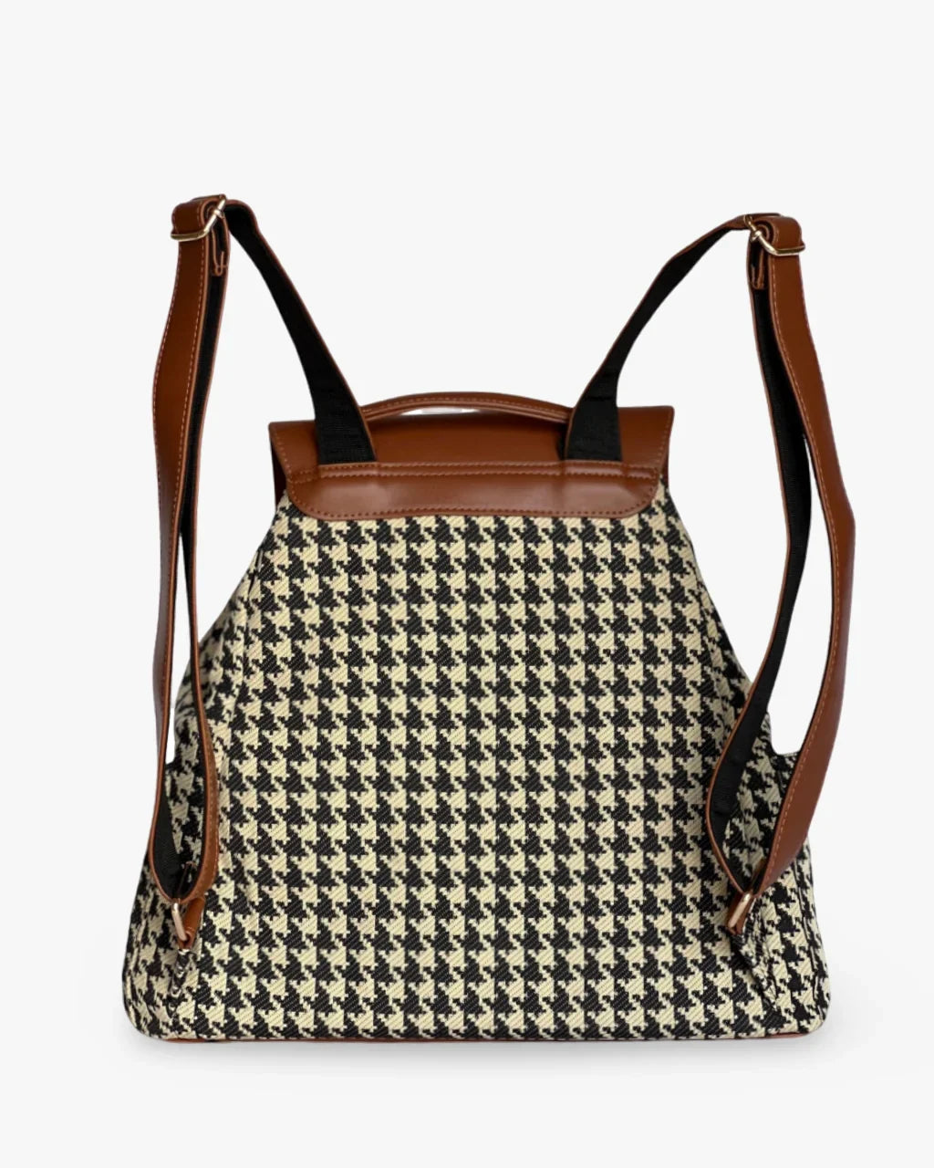 Backpack with houndstooth pattern and brown leather straps on a white background
