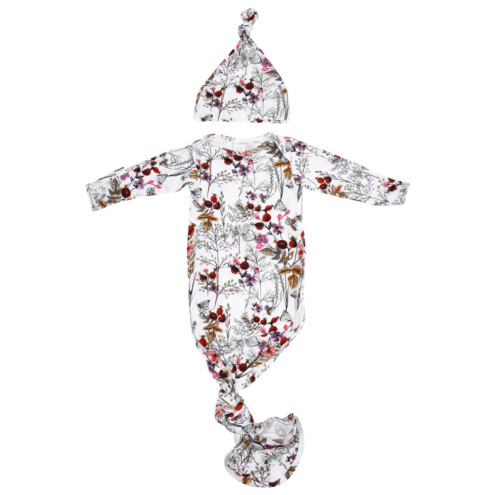 Handpicked fabric baby gowns featuring a beautiful floral design, ensuring comfort and effortless night-time diaper changes.