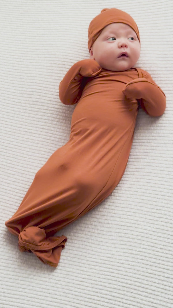 Three Little Tots Knotted baby gown saddle longhorn orange. The top knotted baby gown. Ultra soft bamboo like knotted baby gown