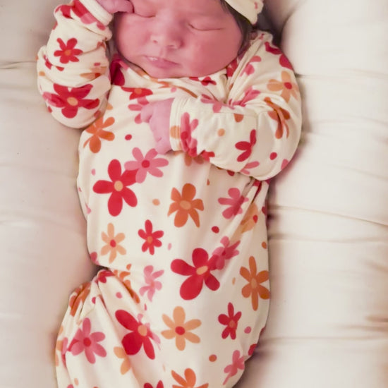 Three Little Tots Flower 70s knotted newborn baby gown is ultra soft and the perfect gift for a newborn baby