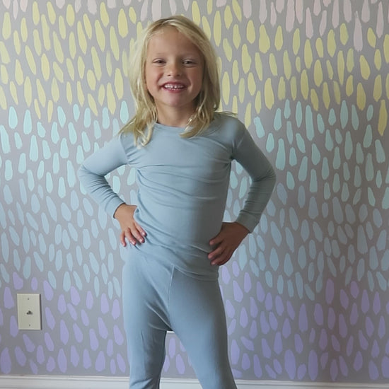Toddler and big kid jammies in matching prints and solids, designed for comfy bedtime or lounging all day.