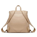 Three Little Tots Signature Diaper Bag Latte Brown, attached to a car seat or stroller