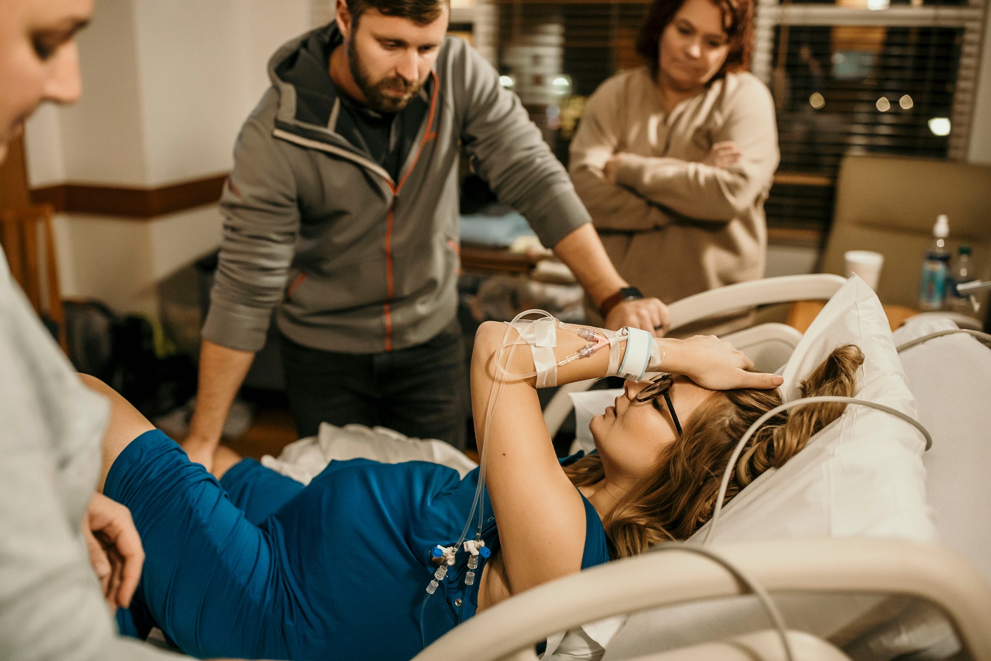 Woman in labor in a Breathable and comfortable labor gowns, ideal for pre and post-baby lounging and a great hospital gown alternative.Breathable and comfortable labor gowns, ideal for pre and post-baby lounging and a great hospital gown alternative.