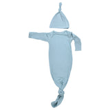 Designed for day or night, this tie-bottom outfit ensures easy diaper changes and gentle dressing.