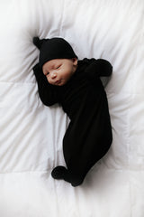 Ultra-soft baby gowns with tie bottom for quick diaper changes and easy pull-down shoulder tabs.