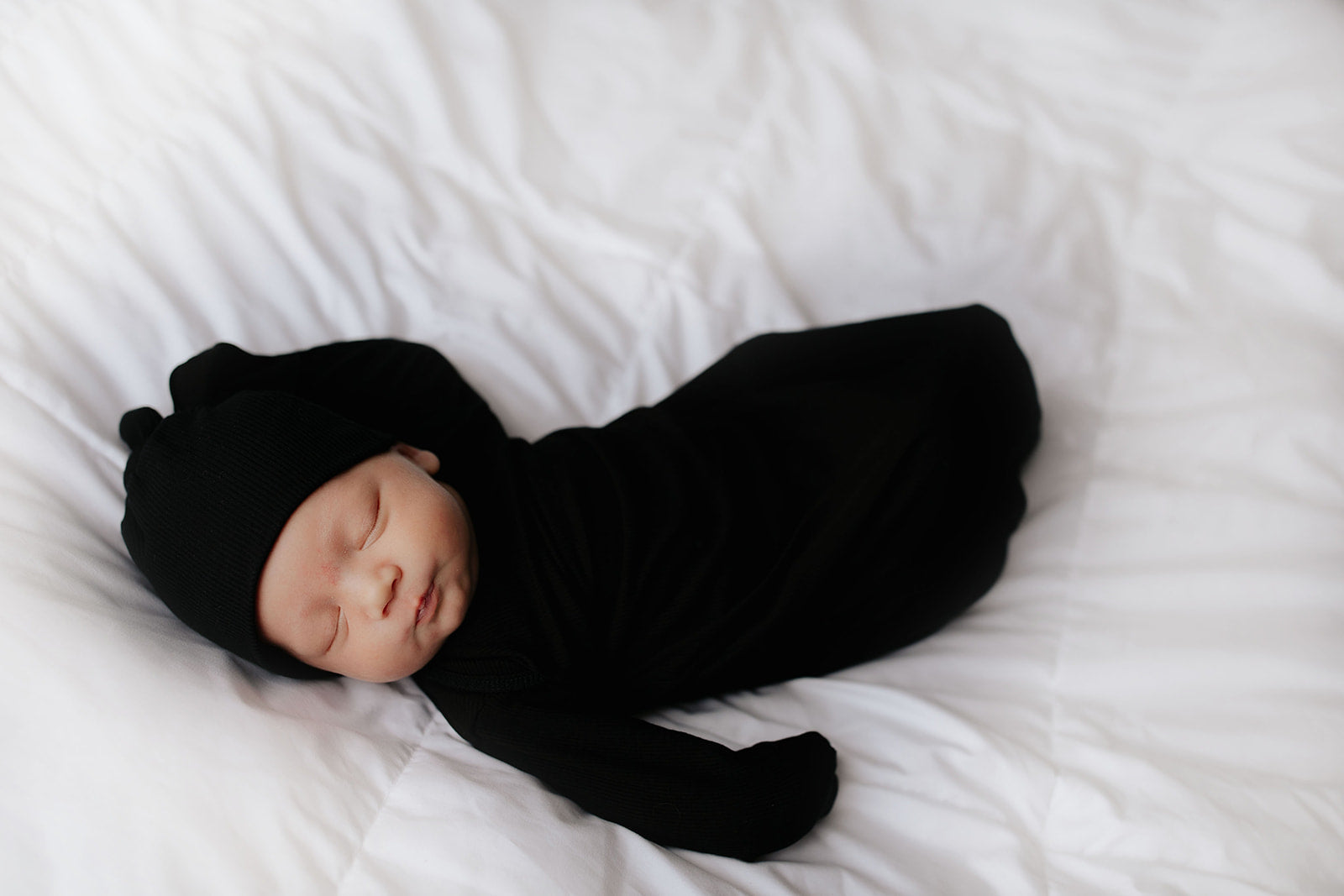 Handpicked fabric blend ensures soft, stretchy baby gowns that simplify night-time changes and dressing.