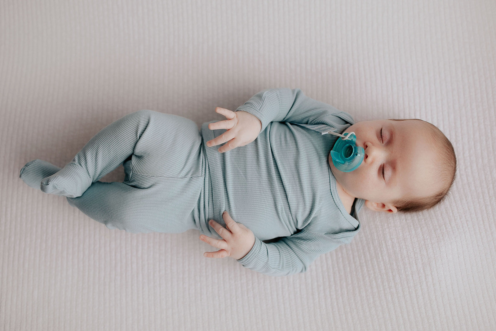 Newborn Jammies with buttery-soft fabric, fold-over mittens, footies for ultimate comfort and all-day coziness.