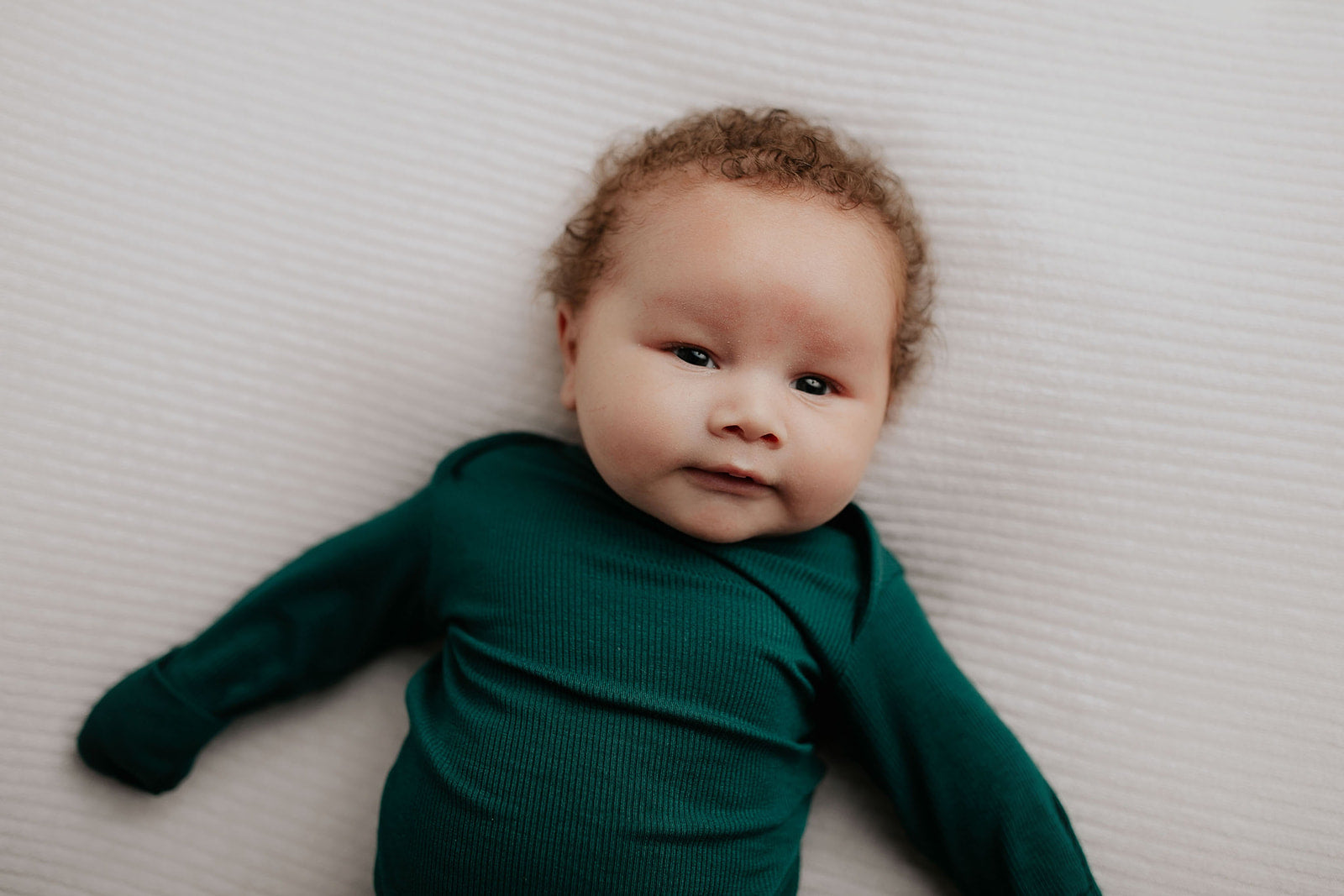 Experience unmatched comfort with our stretchy, handpicked fabric baby gowns, perfect for newborns 5-15 lbs.