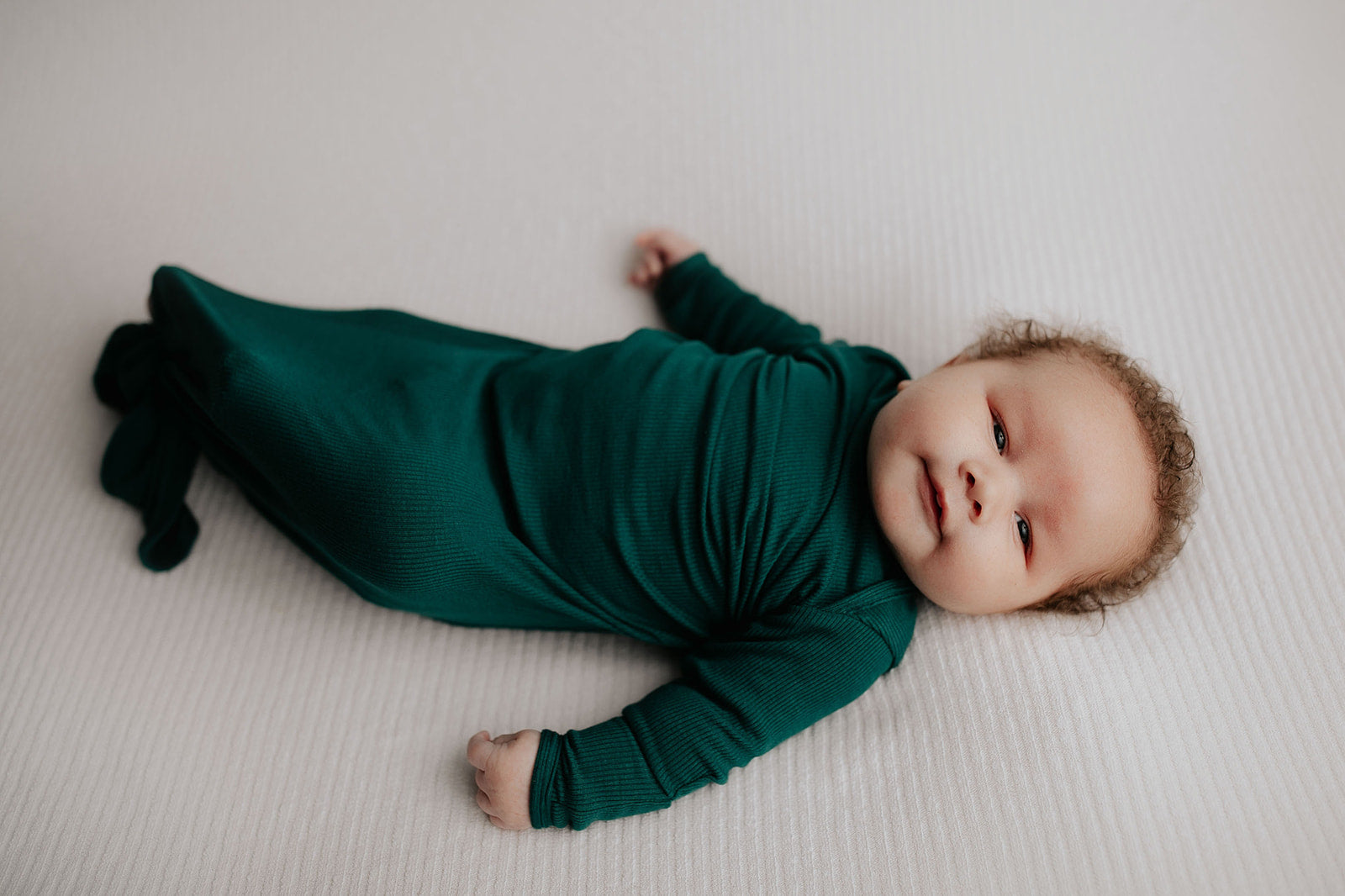 Experience unmatched comfort with our stretchy, handpicked fabric baby gowns, perfect for newborns 5-15 lbs.