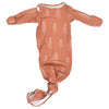 Super soft Christmas-themed baby gowns with stretchy fabric and easy-access tie bottom for quick diaper changes.
