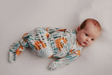 Ultra-soft Dinosaur baby gowns with stretchy fabric and tie bottom for easy night-time diaper changes.