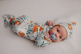 Ultra-soft Dinosaur baby gowns with stretchy fabric and tie bottom for easy night-time diaper changes.