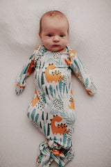 Ultra-soft Dinosaur baby gowns with stretchy fabric and tie bottom for easy night-time diaper changes.