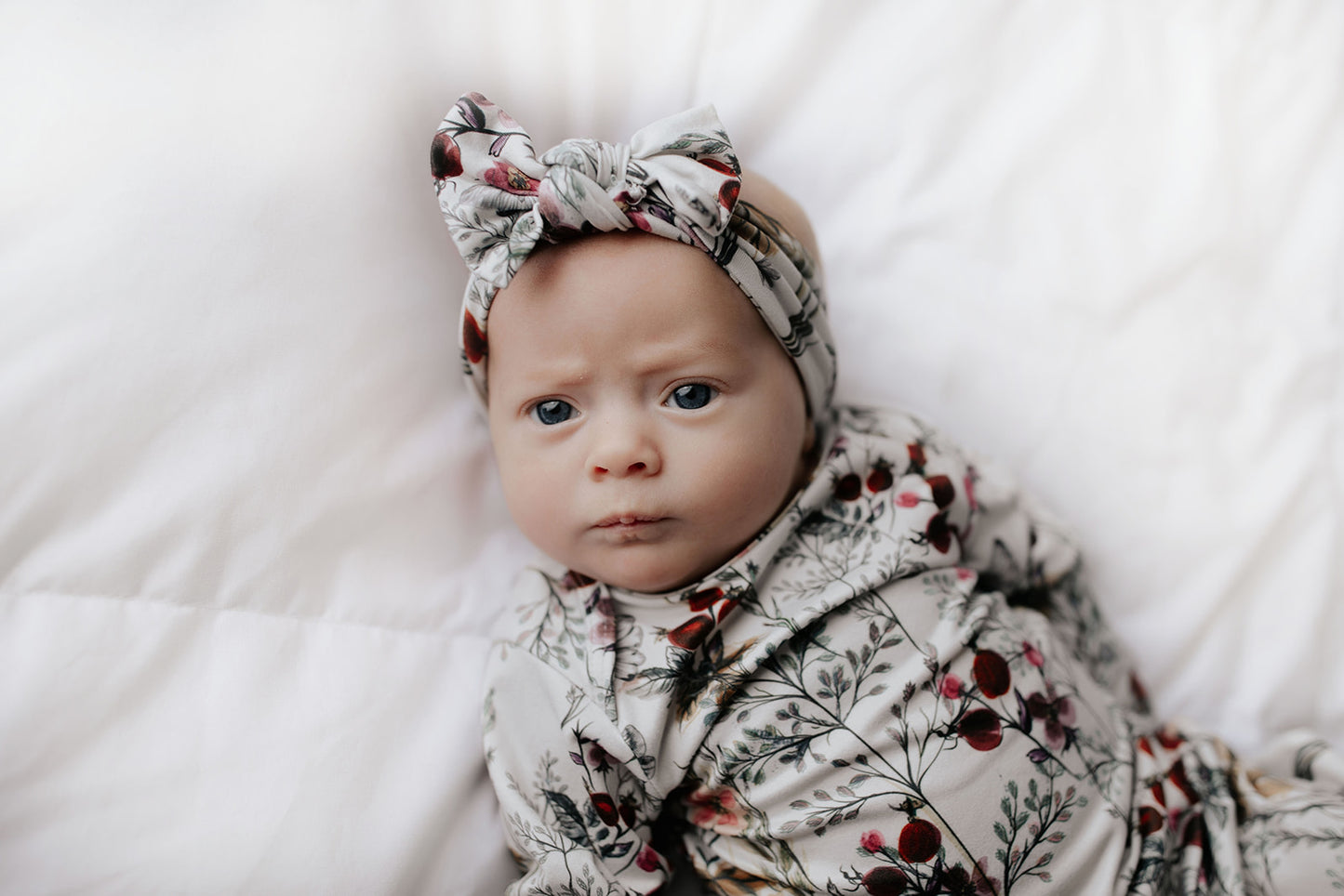 Super soft baby gowns with stretchy fabric, easy tie bottom for diaper changes, and pull-down tabs for dressing ease.