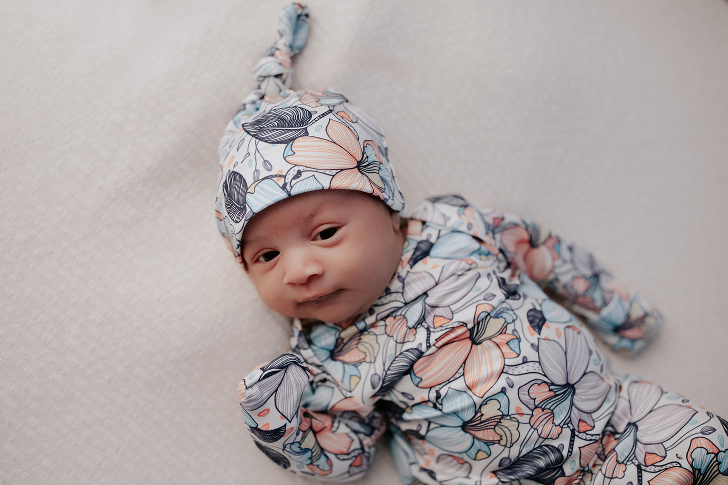knotted baby gown for a newborn photo shoot